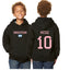 Kids wearing black hoodies with the Argentina flag and the text 'MESSI 10' displayed on the back.